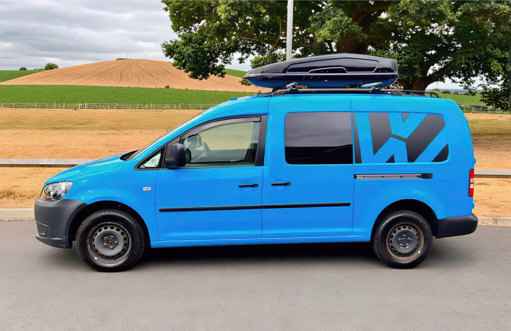 VW Caddy with a rooftop box