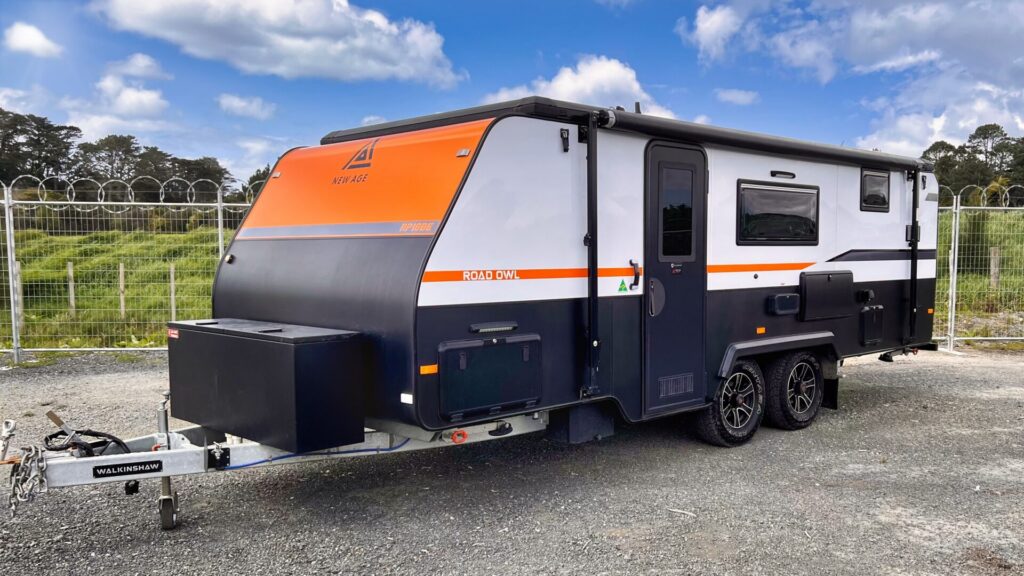 New Age Road Owl caravan side view with roof down