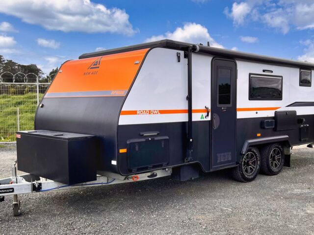 New Age Road Owl caravan side view with roof down